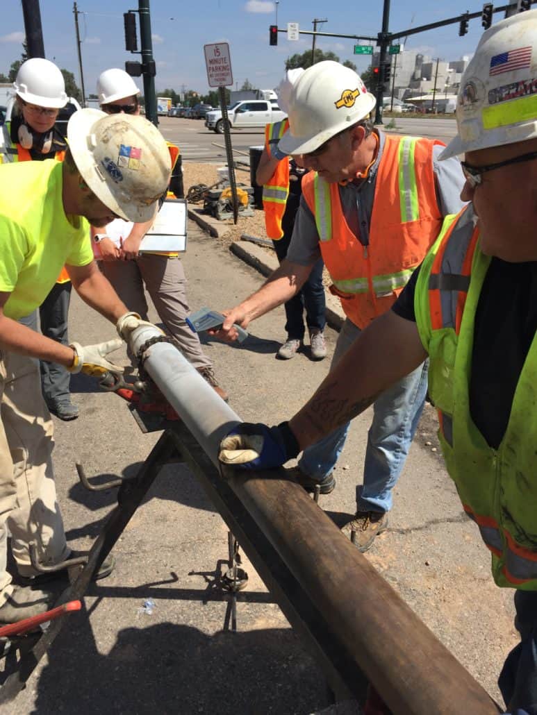 Agfinity #2 Team inspecting gas pipe