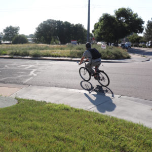 biking to work 2 Man biking on street