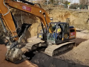 Environmental worked using excavator on the construction site - Environmental Consulting Company - CGRS