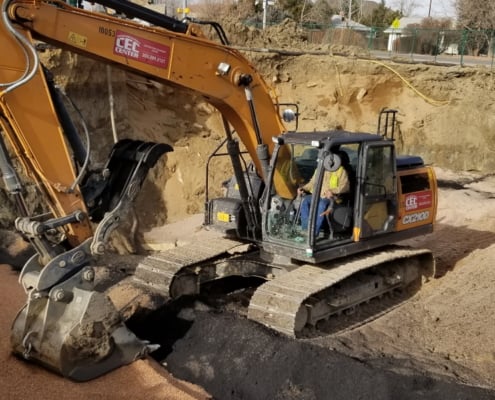 Environmental worked using excavator on the construction site - Environmental Consulting Company - CGRS