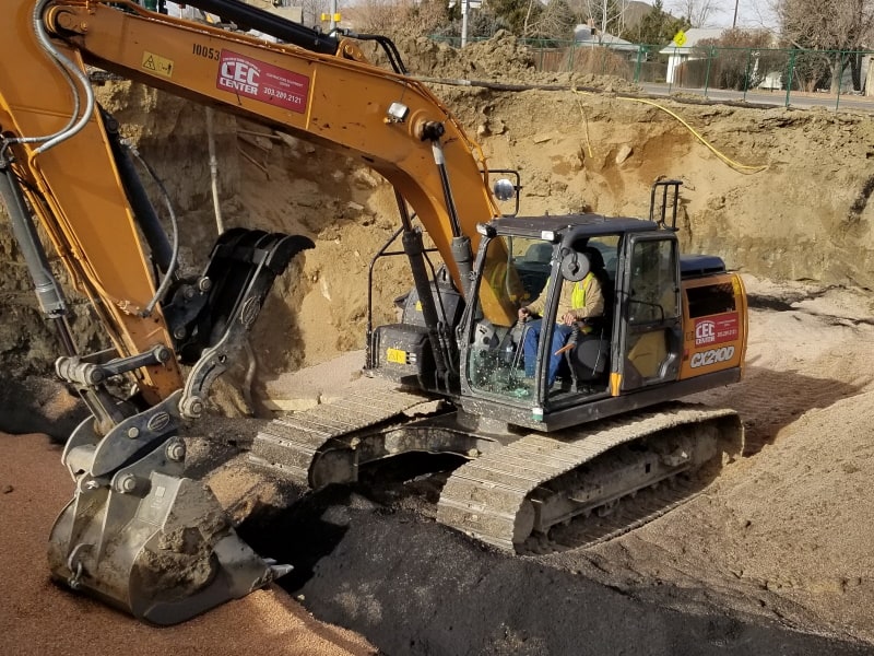 Environmental worked using excavator on the construction site - Environmental Consulting Company - CGRS